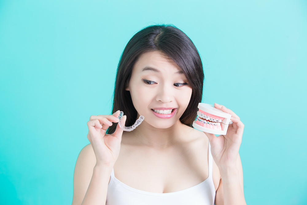 healthy dental concept Is Invisalign in Charleston SC better than braces?
