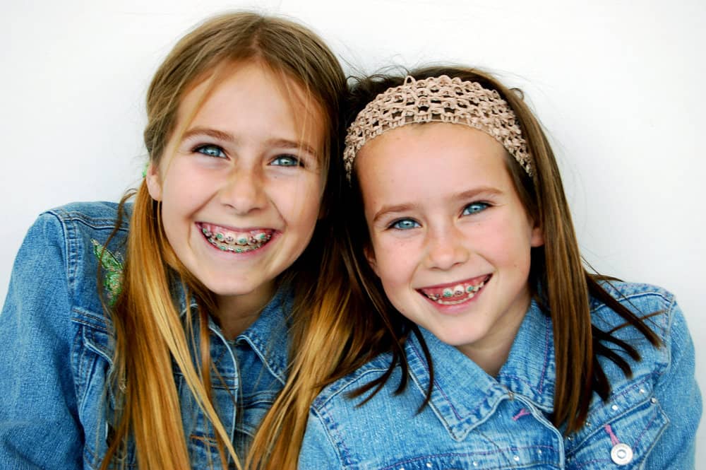 The Pros & Cons of having multiple children in braces Siblings with braces
