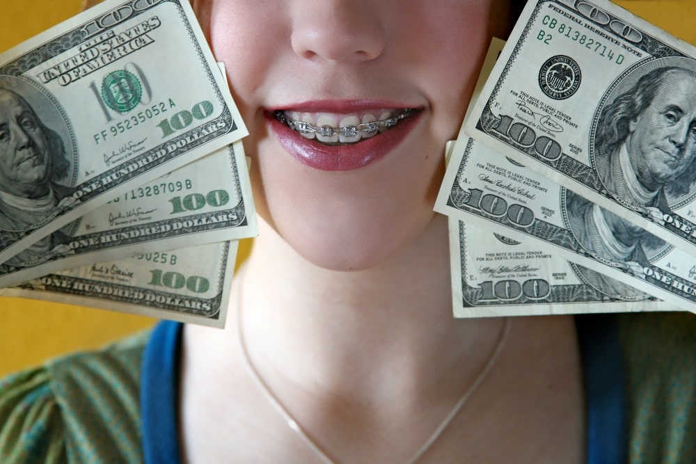 Managing_the_cost_of_braces The idea of having braces may seem far-fetched financially. With all of the daily expenses you have, combined with other bills and responsibilities, you may feel as though having a beautiful smile will never be within reach. Well, think again. There are several opportunities orthodontic practices are giving patients. The chance to have a perfect smile is well within reach for virtually anyone! When it comes to managing the cost of braces, you have options. Finance Options Many orthodontists offer finance options for patients to help curb the costs associated with treatment. Having a published low price for braces and Invisalign can help patients manage the financial responsibilities of orthodontic treatment in a way that works for them. Low prices and low down payments make orthodontic treatment a real option for many families and individuals who otherwise couldn’t afford it. There are no surprises and you’re able to work within your budget to create a plan that will work for you. Braces shouldn’t break the bank. That’s why engaging in financing options through your orthodontist is a way for you to customize their payment options into realistic installments, instead of a daunting figure that needs to be paid upfront. Insurance Plans Many orthodontists accept various insurance plans to help with the cost of treatment. It’s advised that you first check with your insurance provider to see if your plan covers orthodontic treatment. Many orthodontic practices, such as Charleston Orthodontic Specialists, accept all orthodontic insurance plans and will work with the insurance companies on the patient’s behalf. To see if using insurance is an option for you, speak with your provider or provide your insurance information when scheduling your initial consultation and someone on the team can check for you. FSA’s and HAS’s There are other options to help pay for orthodontic treatment and these come in the form of flexible spending accounts (FSA’s) and health savings accounts (HAS’s). To understand how they work, we must first learn what they are: ● FSA: Money is set aside from your paycheck before taxes. This money can then be used to pay for eligible healthcare expenses but must be used by the end of each year. ● HSA: Money is put into a special tax-advantage savings account. It can then be taken out to help pay for qualified medical expenses. The funds roll over from year to year, but HSA’s are only available to those who choose high-deductible insurance plans. When you take money out of your HSA or FSA to pay for these qualified medical expenses, you won’t have to pay income taxes on that amount. Speak with your employer to see if this is an option that is offered to you. Your Finance Options As you can see, bringing orthodontic treatment within reach is possible for many more patients than in the past. With many orthodontic practices offering convenient ways to finance treatment, families and individuals alike are finally able to correct the issues with their teeth. Don’t let the worry about paying for braces or Invisalign deter you from fixing these issues. Select an orthodontist who will work with you to craft a treatment plan that fits into your budget. At Charleston Orthodontic Specialists, we offer a variety of ways to get a spectacular smile! Call (843) 4-BRACES to learn more about our finance options.