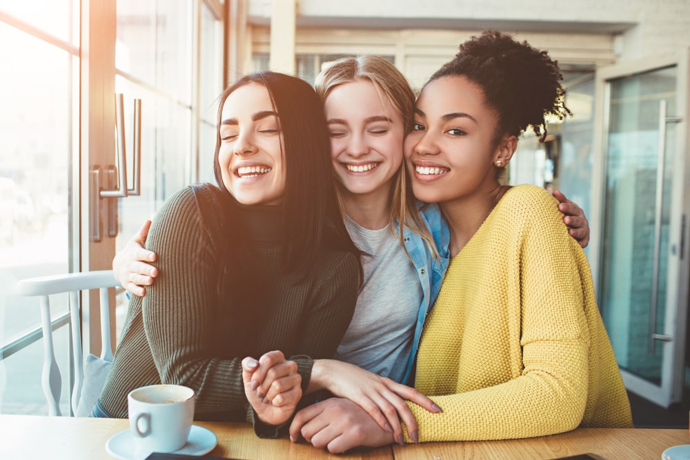 is-invisalign-right-for-your-busy-teen teens smiling