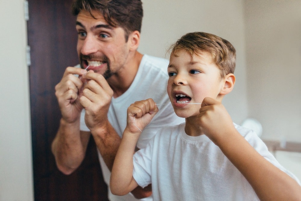 convincing-your-kids-to-floss Learn from an orthodontist in Charleston how to convince your kids to floss.