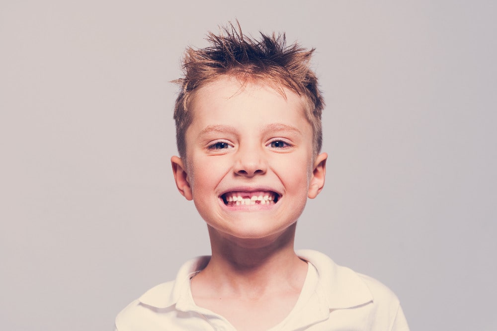 losing baby teeth, will it make my child need braces?