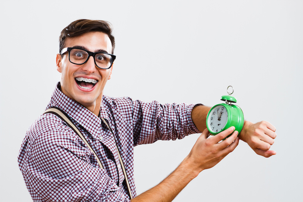 Nerdy man is showing that there is no time to waste Should you use Propel to speed up your treatment with braces in Charleston SC?